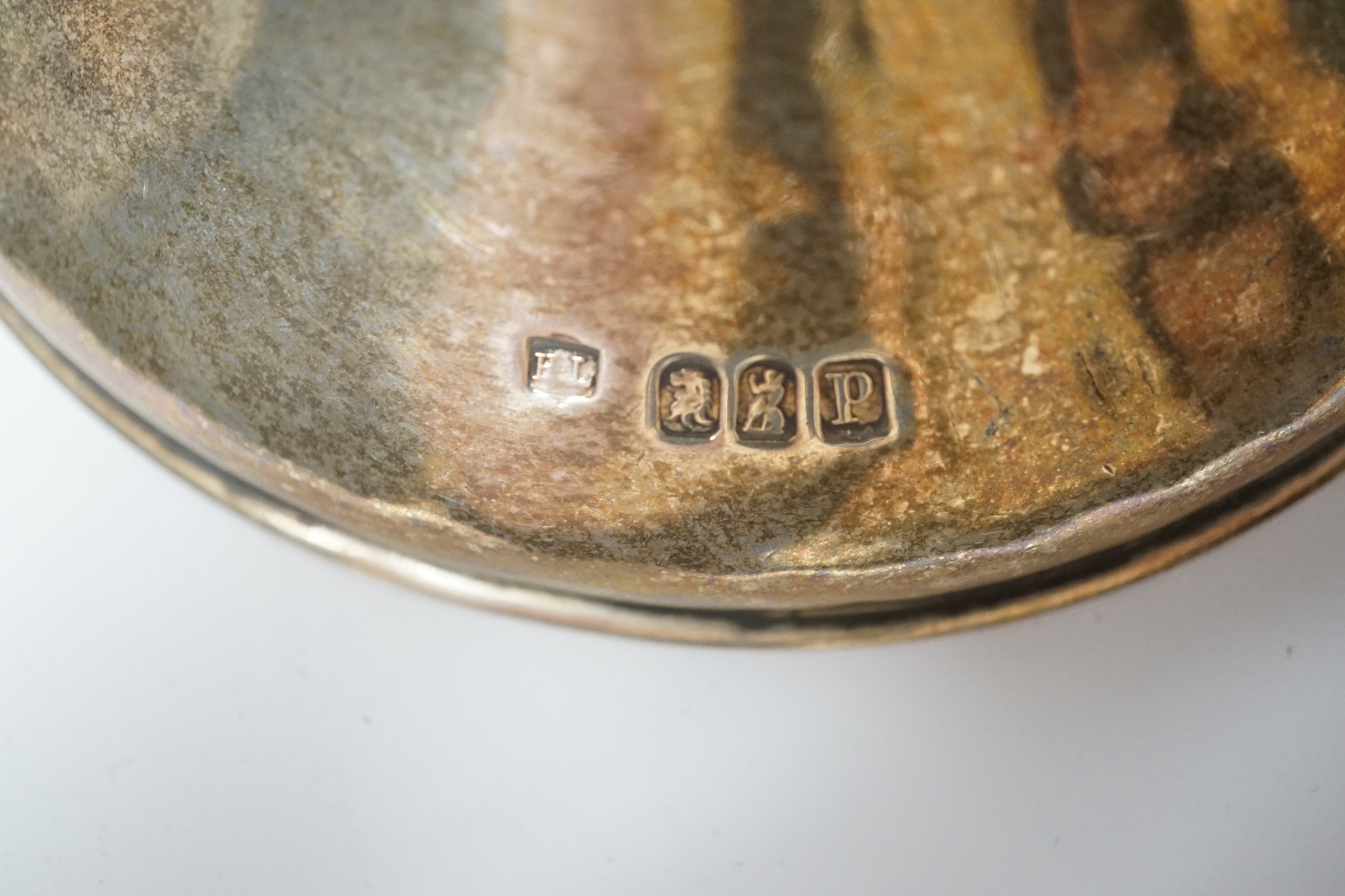 A pair of George V Britannia standard silver salts, of waisted form, with two matching spoons, Lambert & Co, London, 1910, height 79mm, 22oz.
